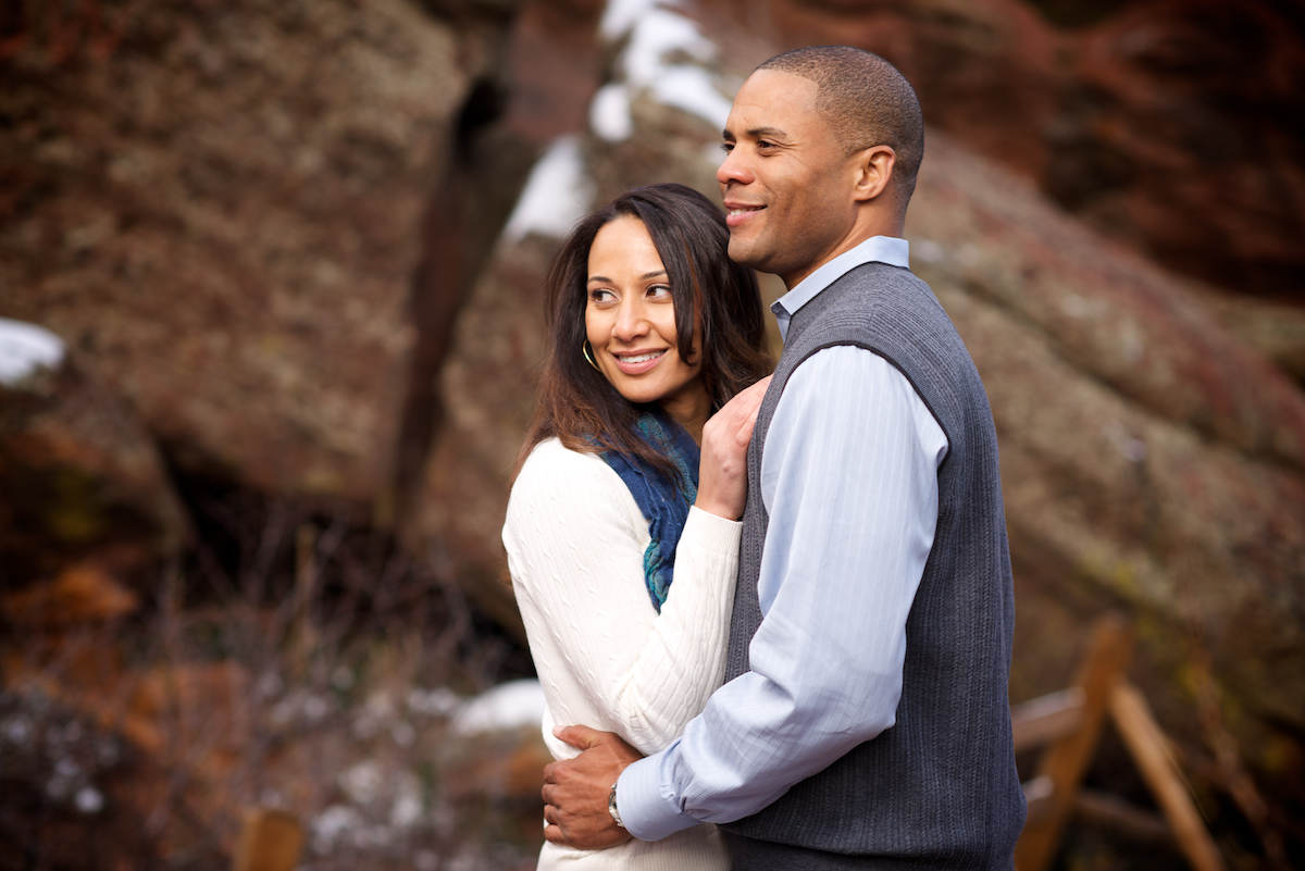 red-rocks-park-morrison-colorado-fall-engagement-photography-cuddle-in-grass