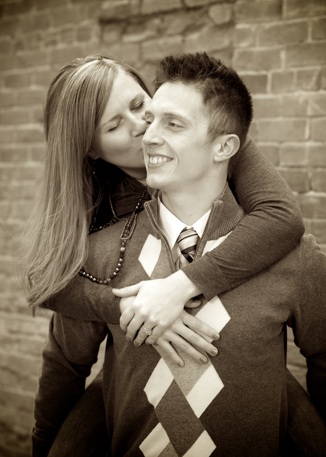 fort-collins-colorado-winter-engagement-sepia-girl-kiss-guy