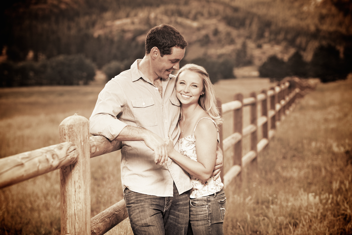 Lily Lake Estes Park Colorado Engagement Picture Rustic Fence Relaxed Couple