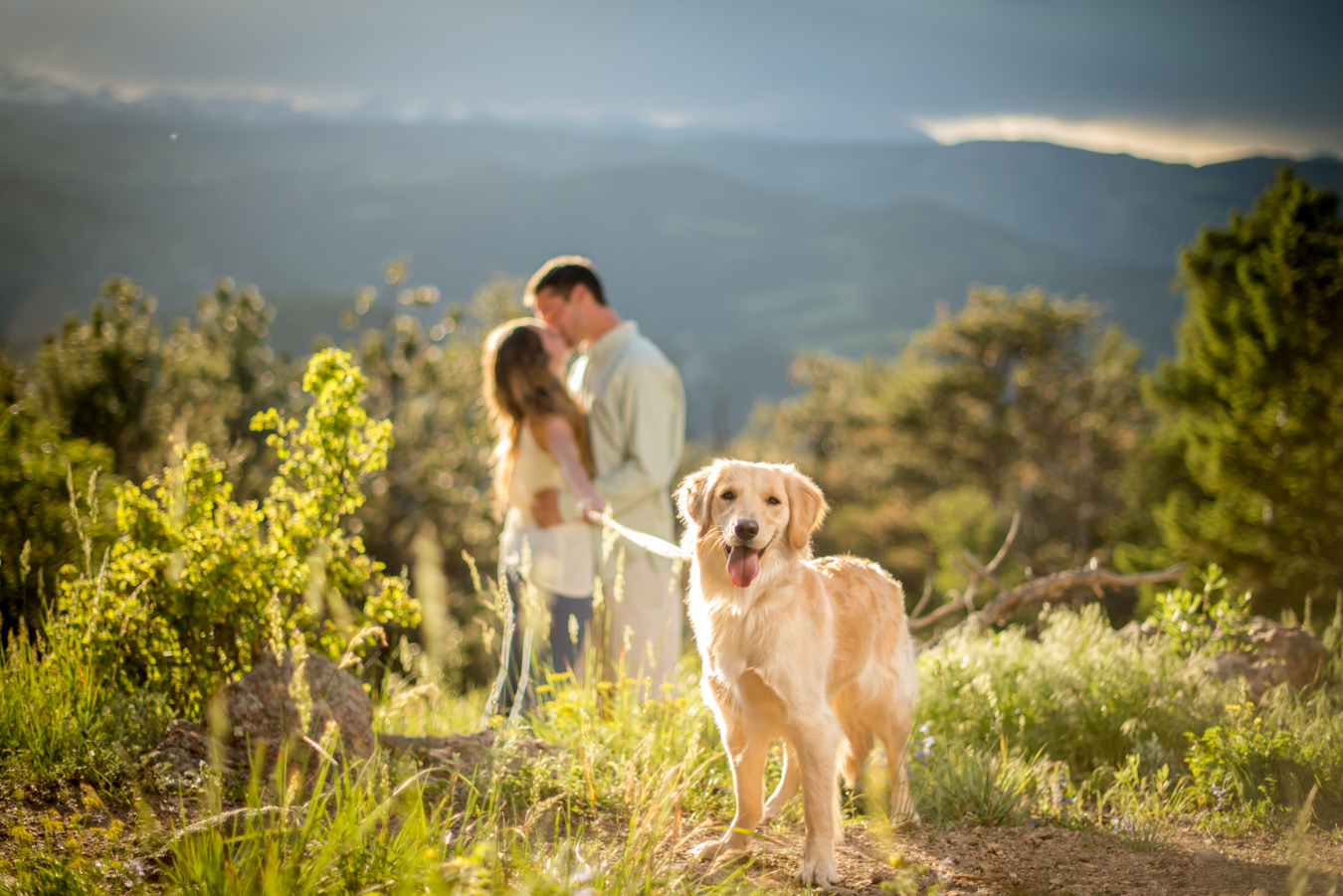 Proposal Flagstaff Mountain Boulder Couple Kissing in Background with Dog