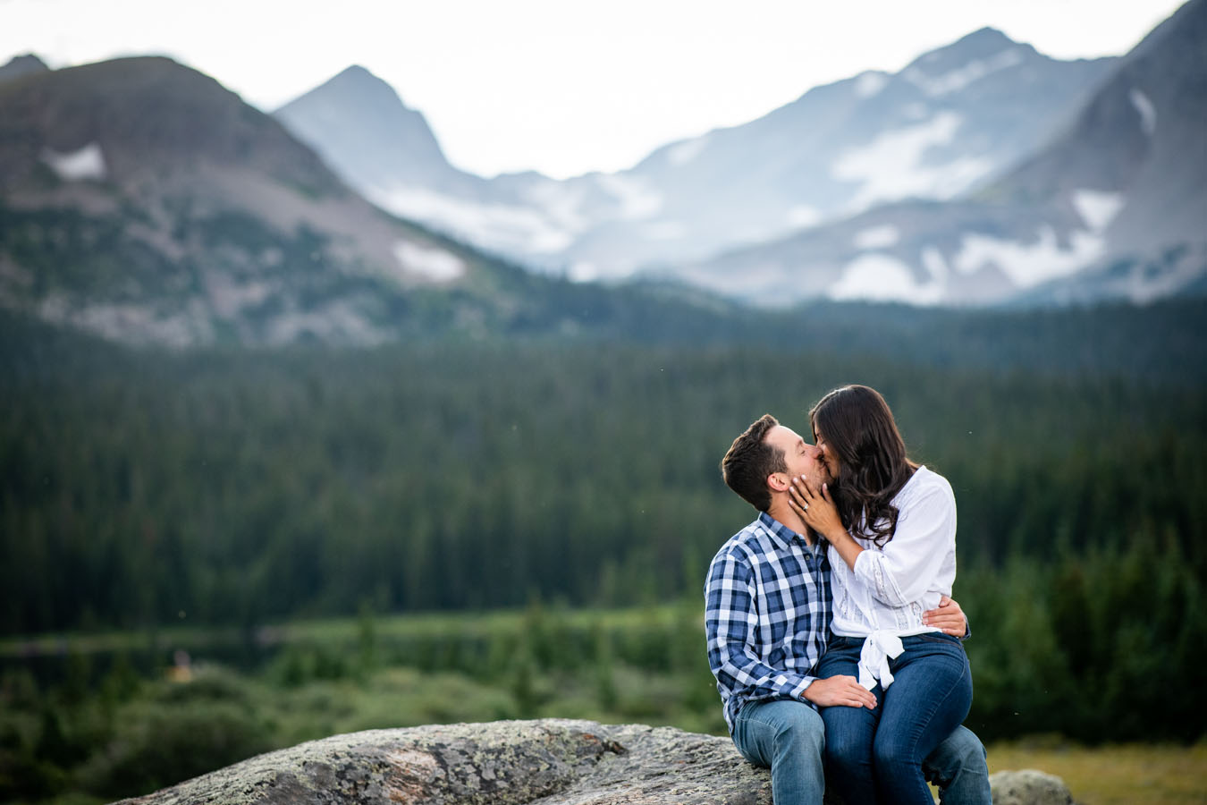 Brainard Lake Summer Sunset Engagement Session Sitting in His Lap Kissing  Him | Colorado Wedding Photographers | Joe and Robin