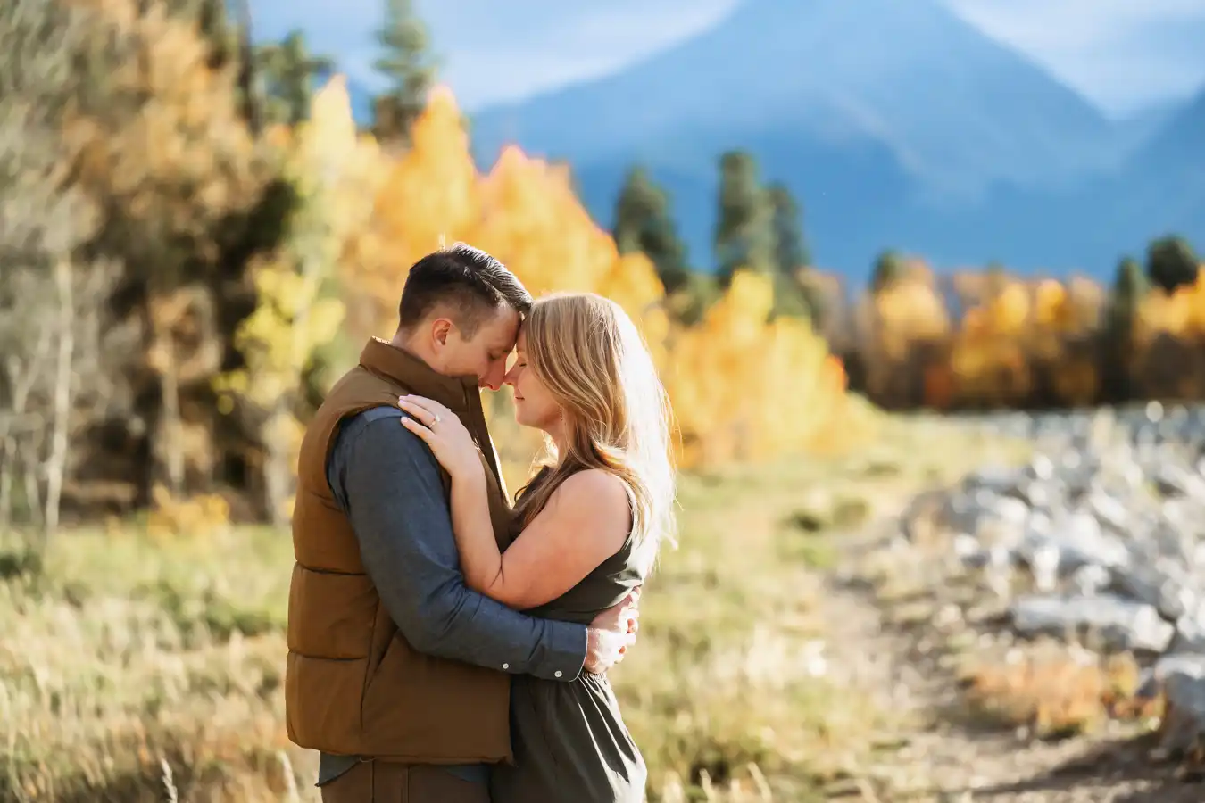 Twin Lakes Fall Proposal Couple with Heads Together