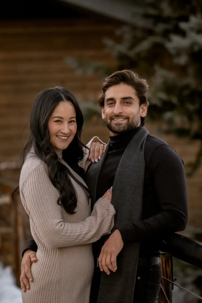 Breck Blue River Plaza Engagement Photos on bridge