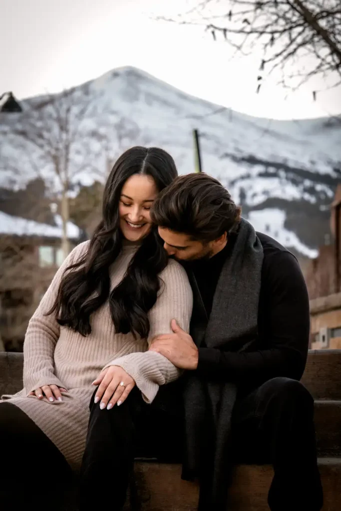 Breck Blue River Plaza Proposal Kiss on Shoulder