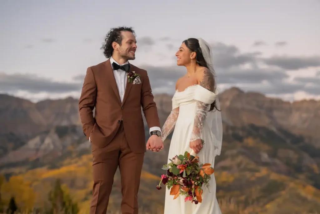 Telluride Fall Colors Wedding Dusk Holding Hands