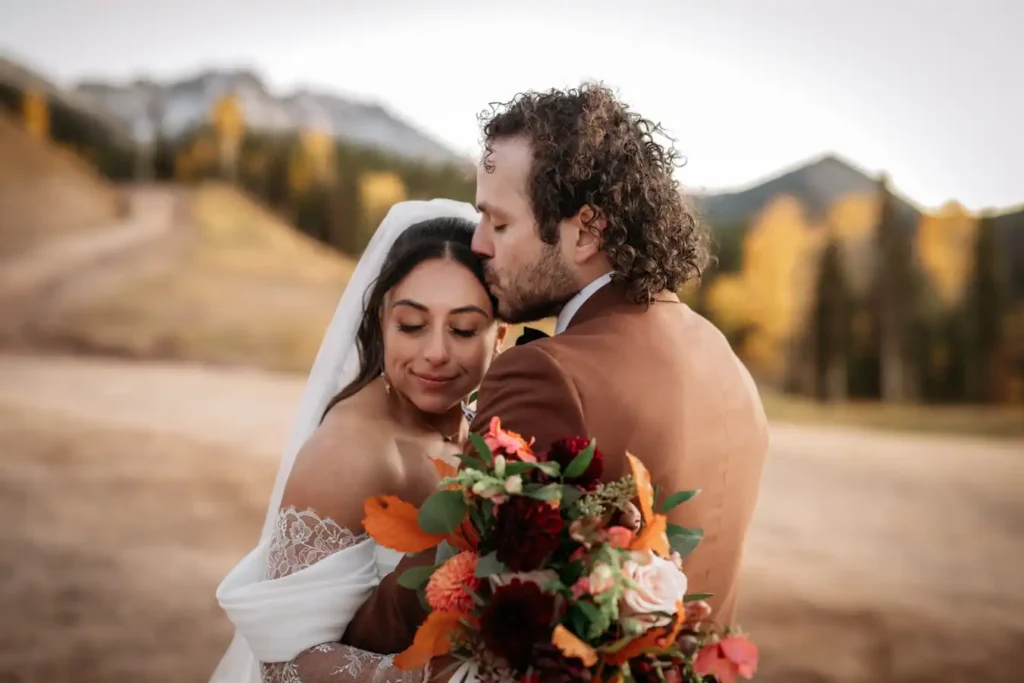 Telluride Fall Colors Wedding Dusk Kiss on Head