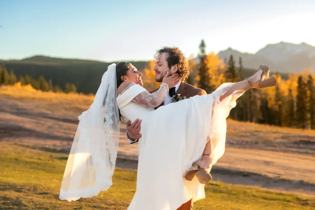 Telluride Fall Wedding Sunset Bride in His Arms