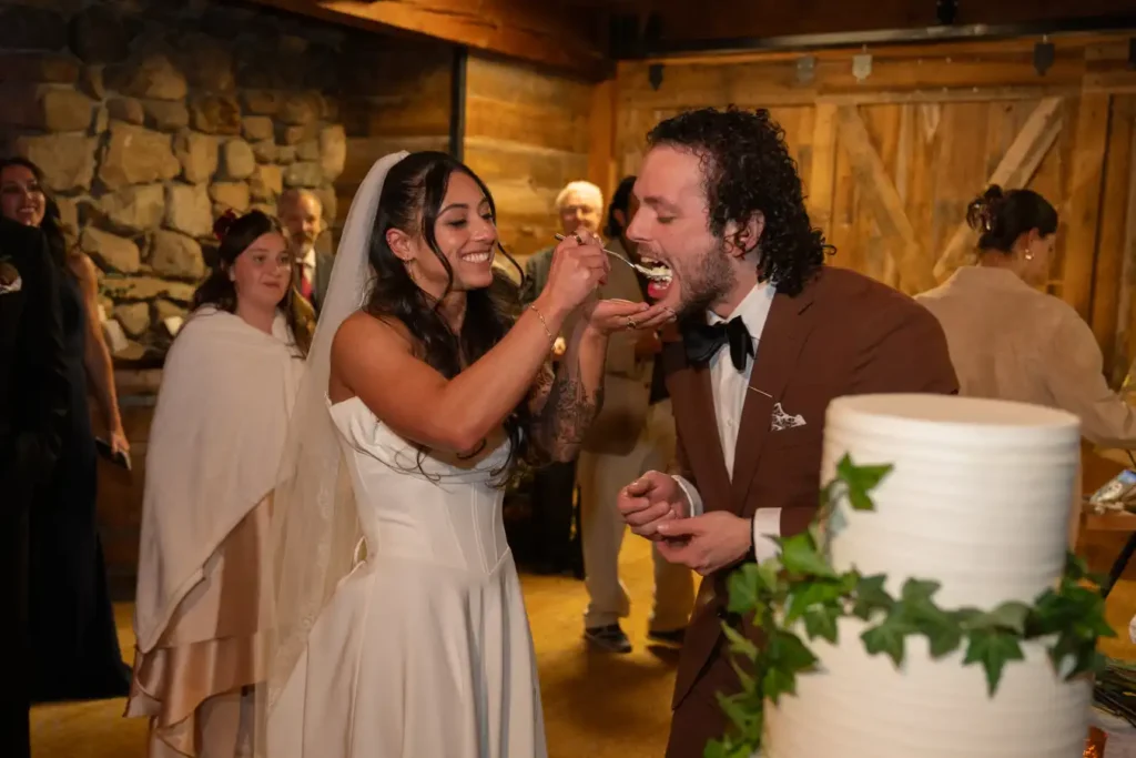 Telluride Gorrono Ranch Wedding Cake Cutting Groom