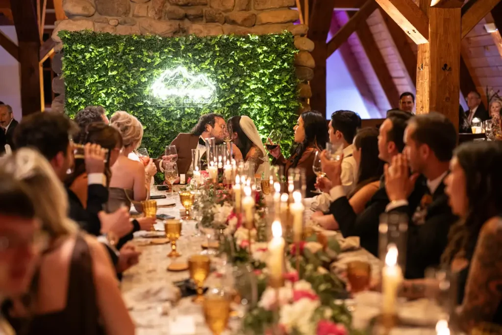 Telluride Gorrono Ranch Wedding Kiss Down the Table