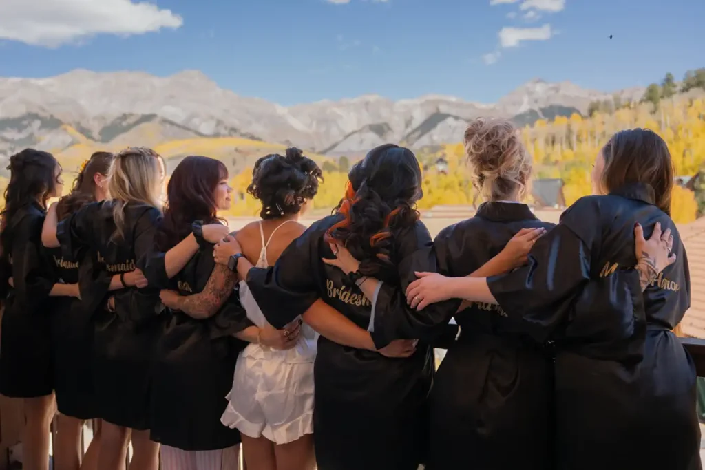 Telluride Wedding Bridemaids in robe on deck