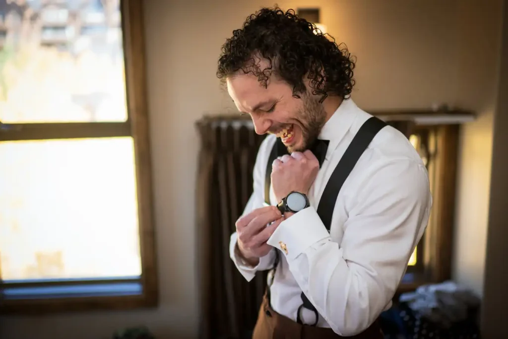 Telluride Wedding Getting Ready Groom Putting on Watch