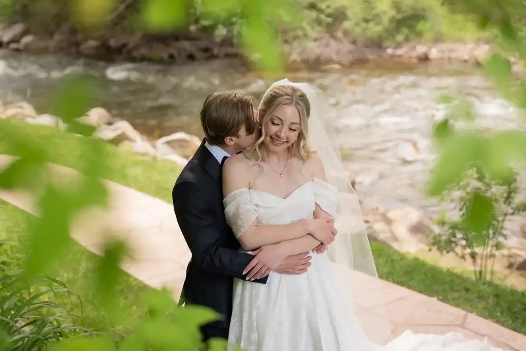 Boulder Creek Wedgewood Wedding Arms Around Bride