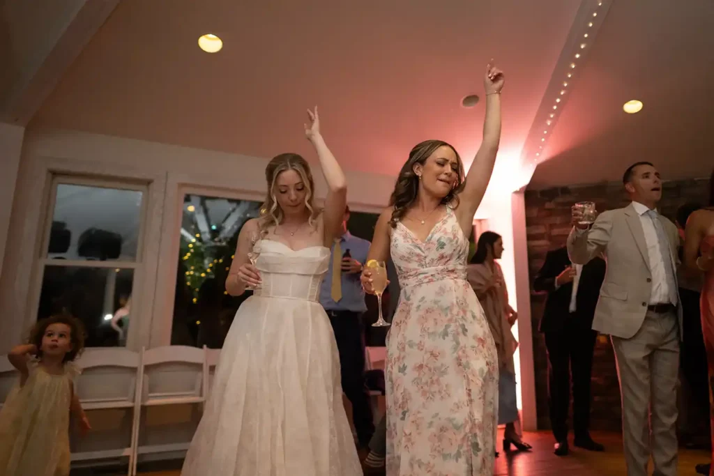 Boulder Creek Wedgewood Wedding Dancing Bride and Sister