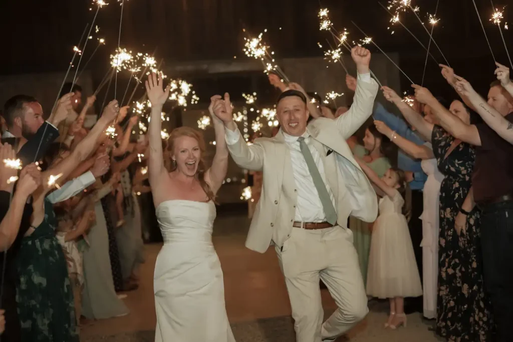The Barn at Sunset Ranch Wedding Sparkler Exit Cheer