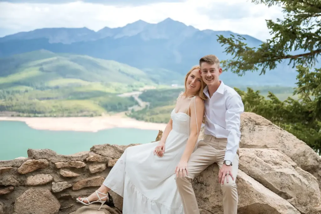 Sapphire Point July Engagement White Dress Sitting on Rock